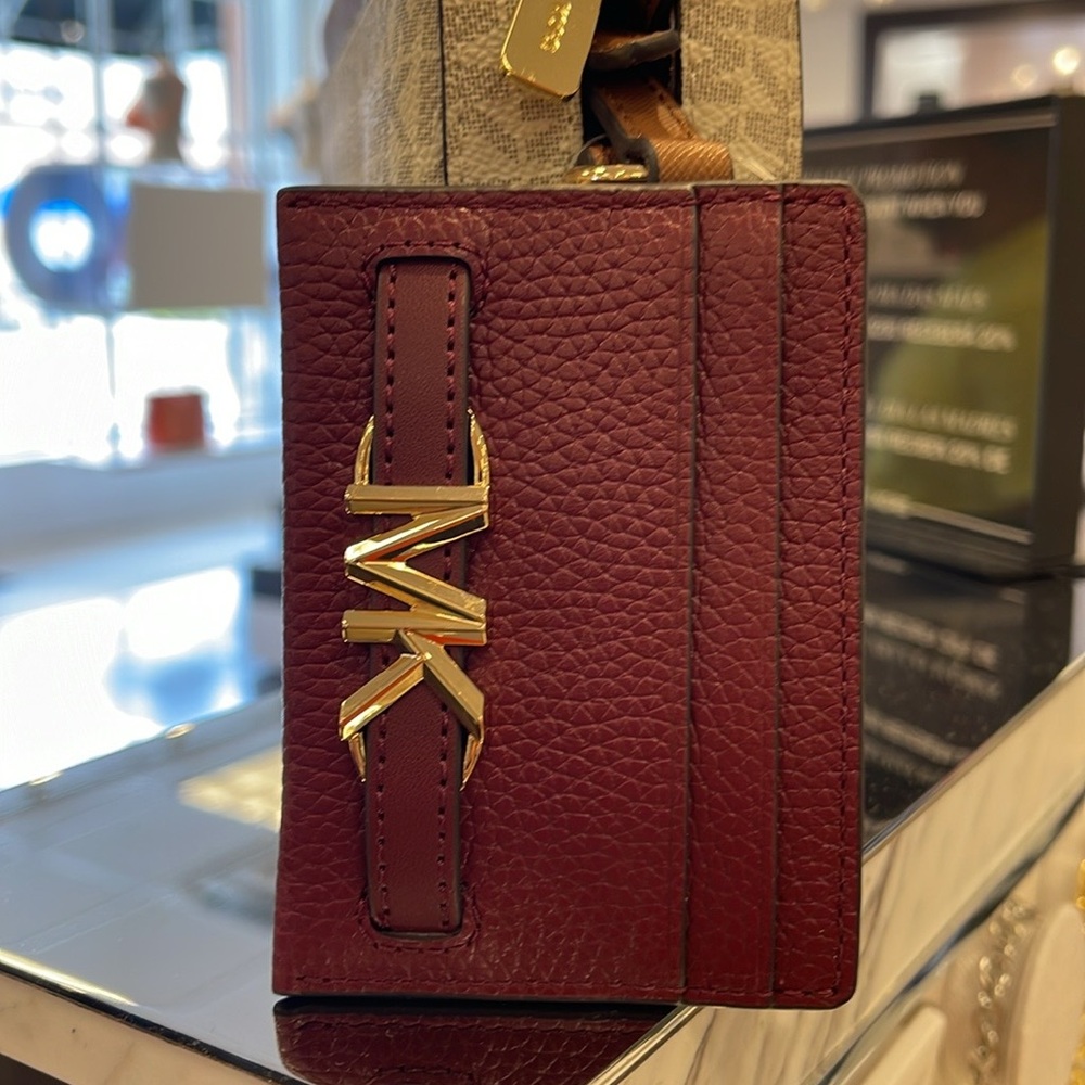 MICHAEL KORS
Reed Large Pebbled Leather Card Holder Case
Dark Cherry 
NWT - Picture 5 of 16